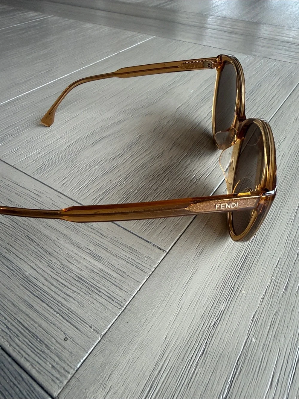 Fendi Amber Tinted Round Sunglasses